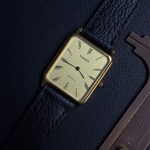 TISSOT TANK GOLD ROMAN DIAL