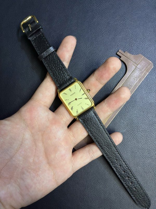 TISSOT TANK GOLD ROMAN DIAL