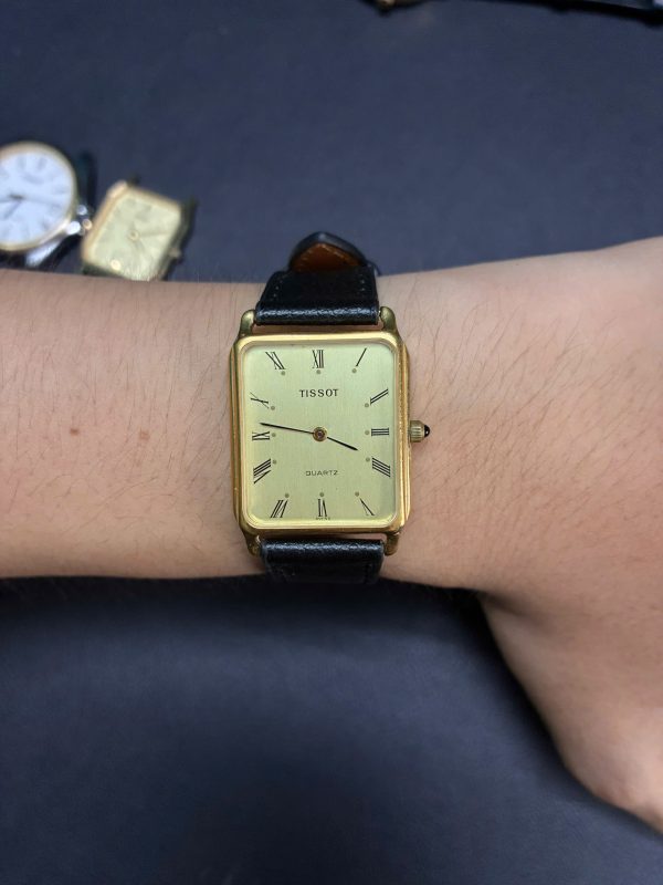 TISSOT TANK GOLD ROMAN DIAL